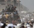 Dei camion di aiuti entrano a Gaza dopo l'annuncio della sospensione tattica da parte di Israele