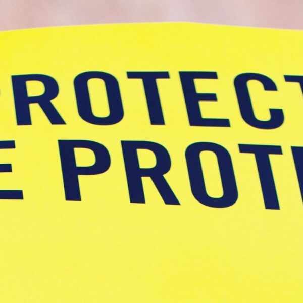 Protect the protest banner