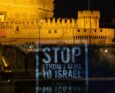 proiezione di "stop arming israel" sul muro di castel Sant'Angelo a Roma per chiedere lo stop al trasferimento di armi dall'Italia