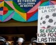 cartellone "dietro la coppa si nascondono le fosse e le truppe"